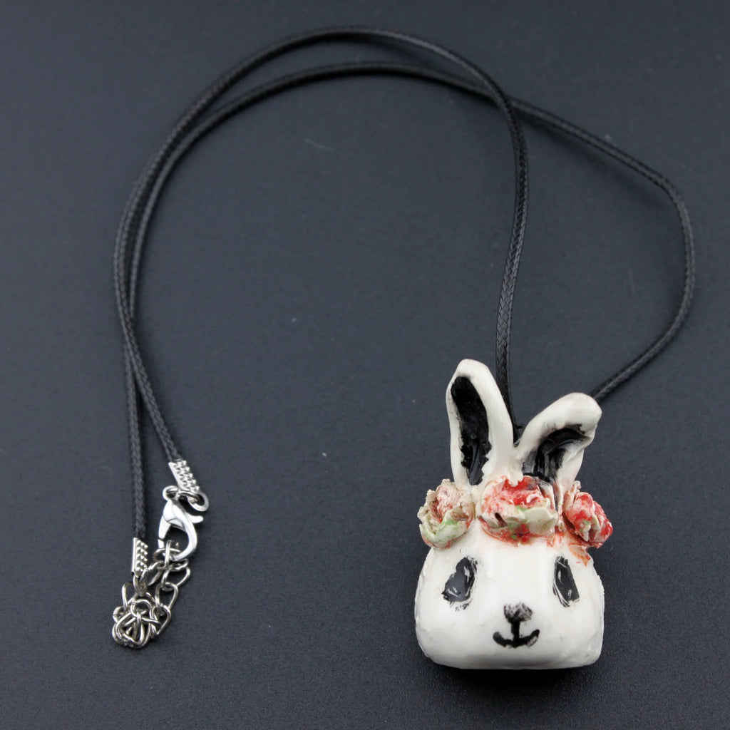 Collier petit animal en céramique