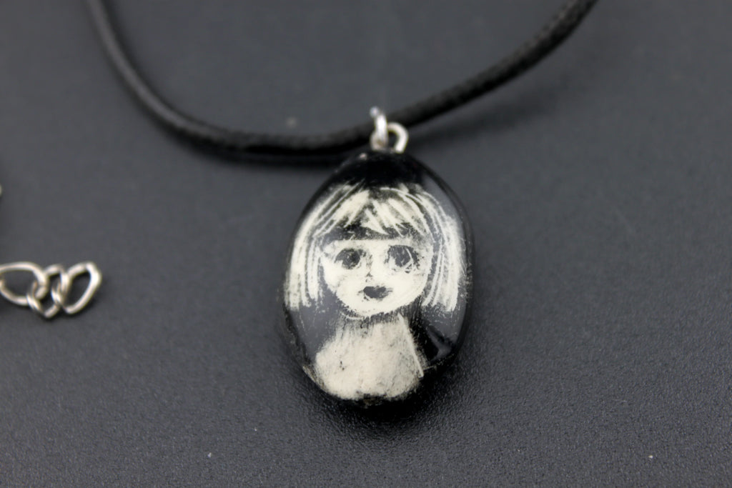 collier petite tête