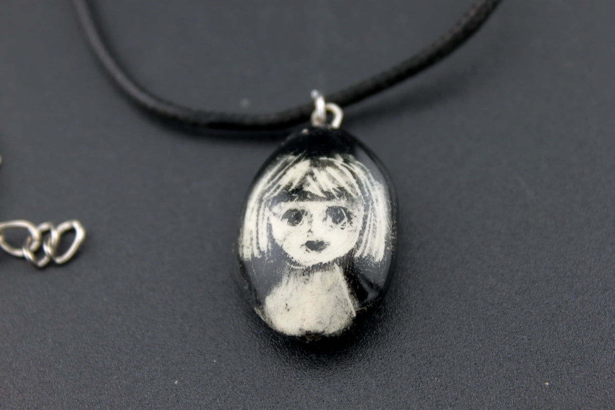 collier petite tête