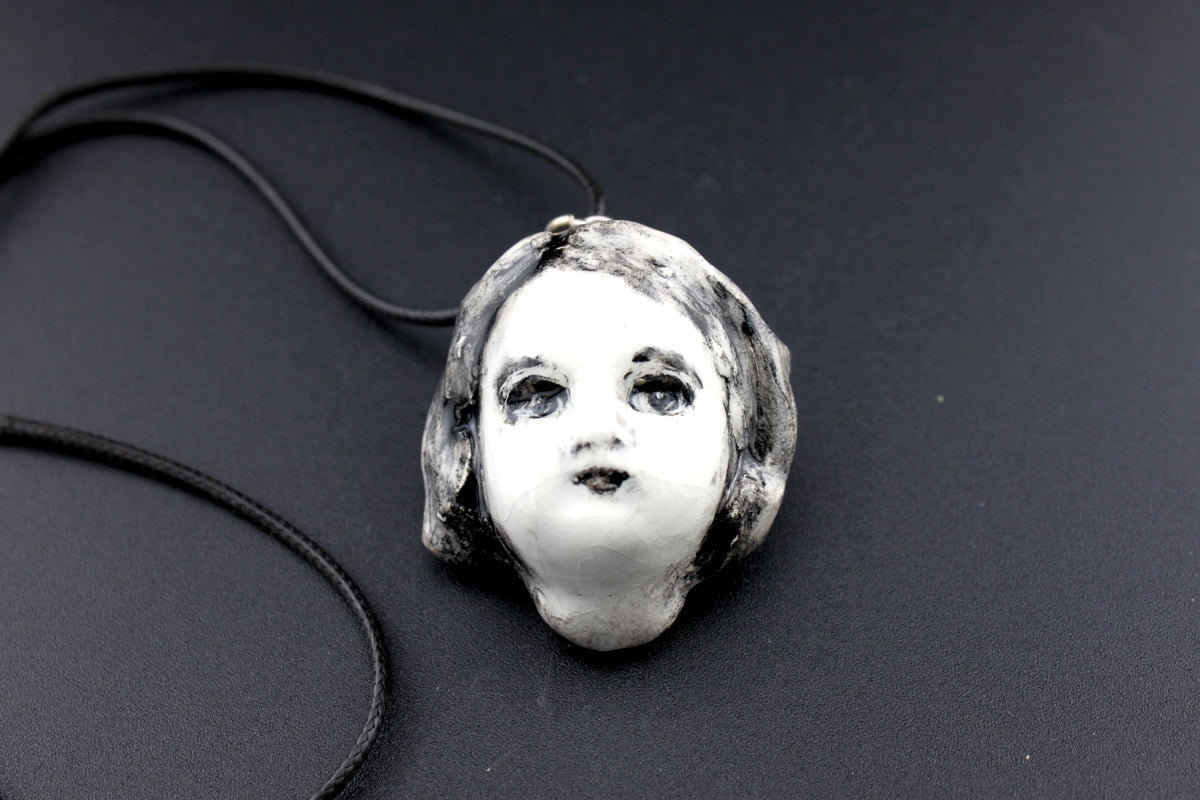 collier petite tête