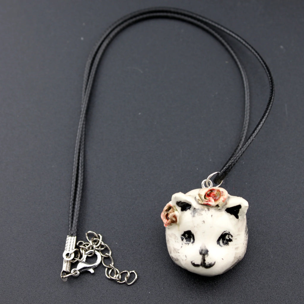 Collier petit animal en céramique