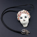 collier petite tête