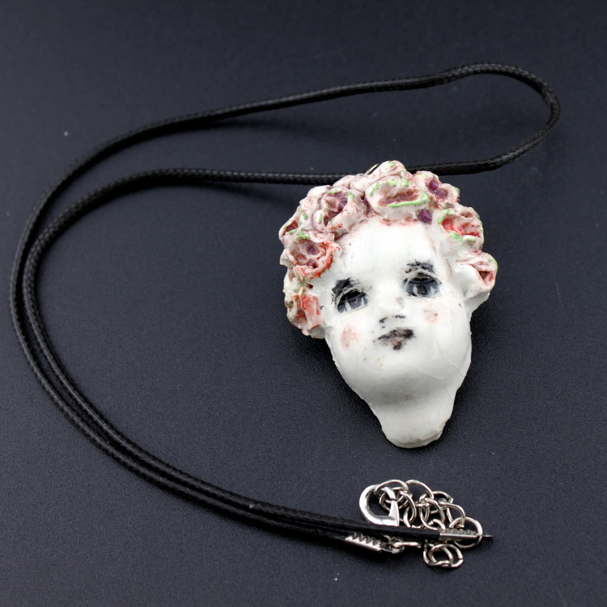 collier petite tête