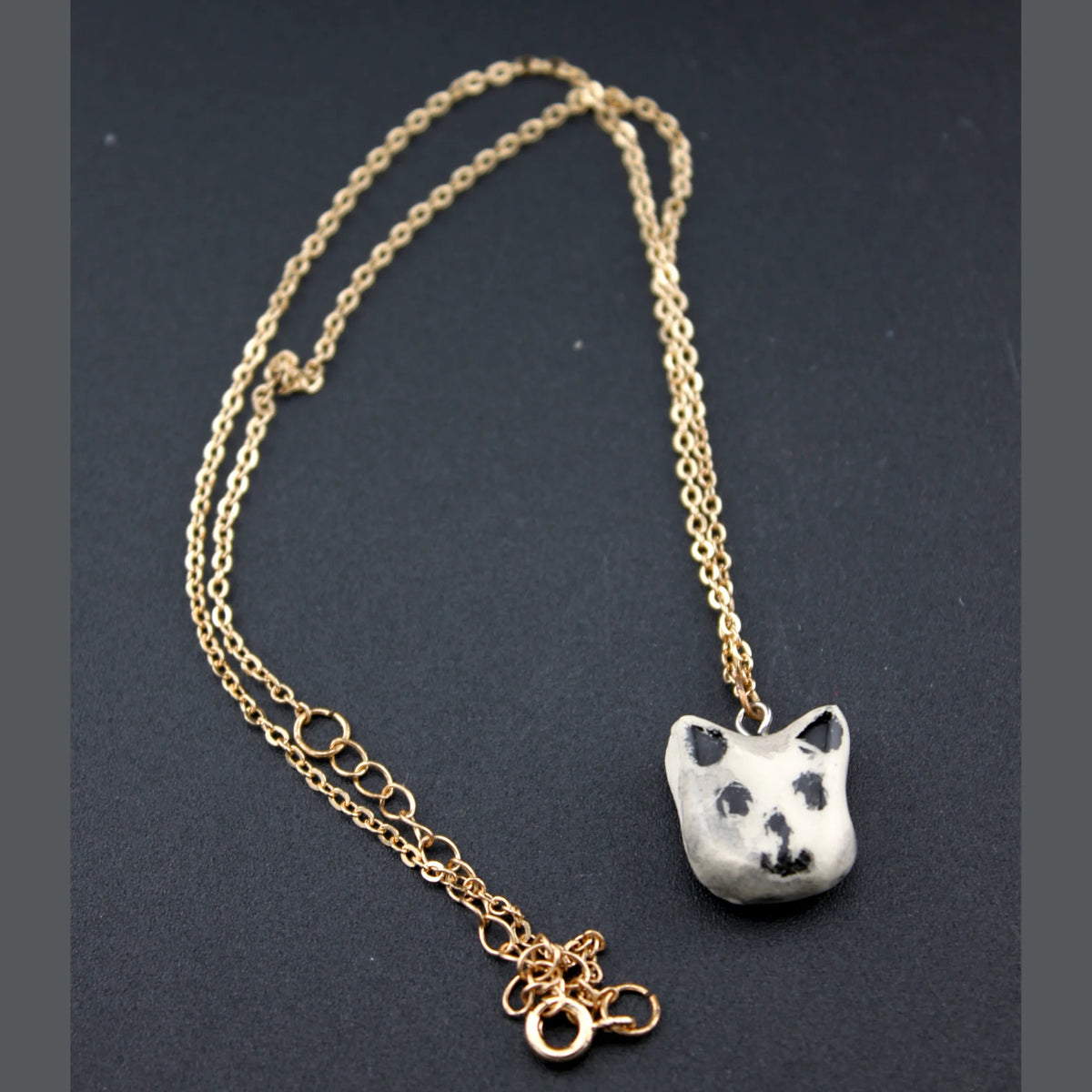 Collier petit animal en céramique