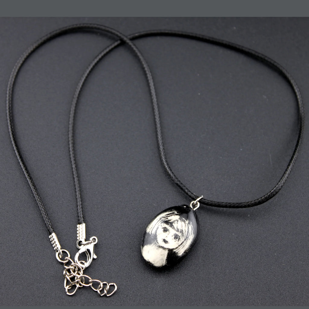 collier petite tête