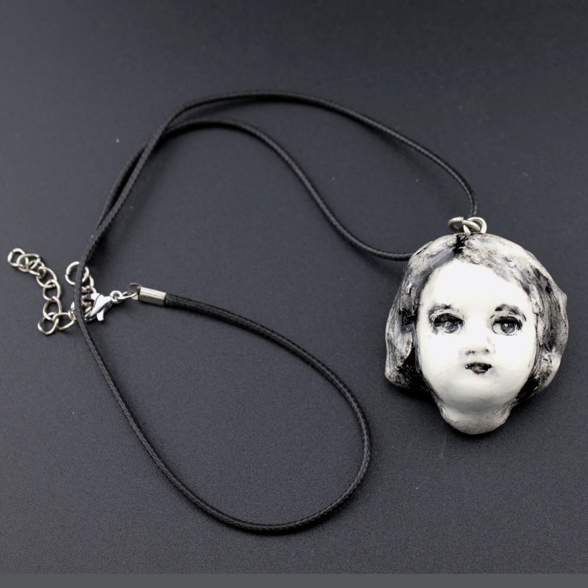 collier petite tête